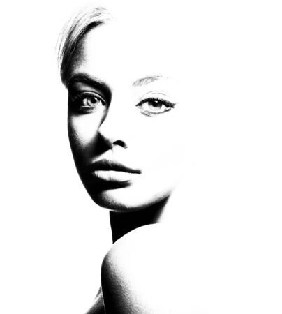 High contrast black and white portrait of a beautiful girl.の写真素材