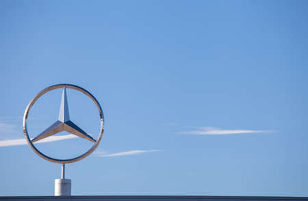 Shiny metal logo of a Mercedes Benz. Germany, Bremen, on May 6, 2020.