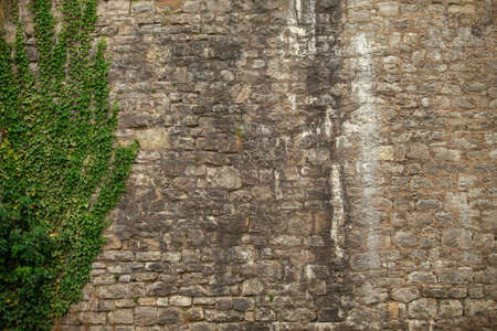 Brick wall of an old ashlar castle.の写真素材