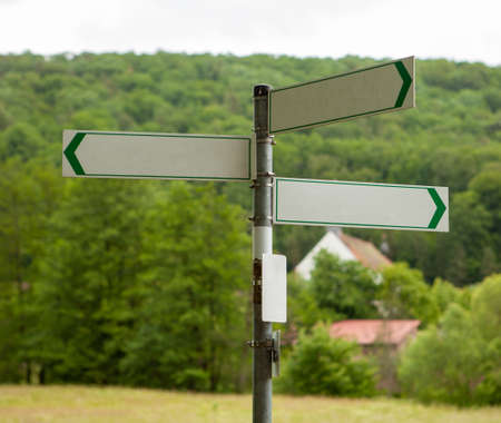 Signposts on a country road. Copy space.