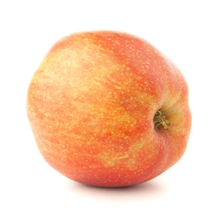 Red apple on a white background with a shadow.の写真素材
