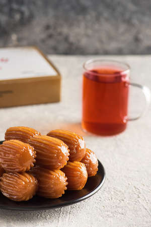 PUMP. Traditional Turkish Dessert tulumba with Turkish tea.