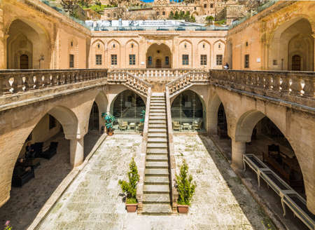 MARDIN, TURKEY - APRIL 23, 2019: Mardin Artuklu University Social Facility and Hotel. Beautiful courtyard view. Mardin, Turkey.のeditorial素材