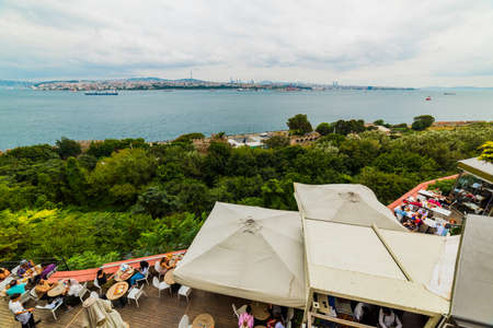 ISTANBUL - AUGUST 15, 2019: Tourists on the Garden of Topkapi Palace with bosphorus view. ISTANBUL TURKEY.のeditorial素材