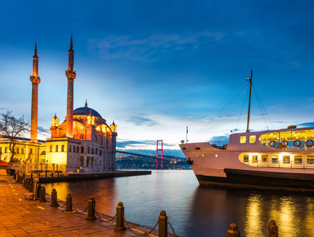 ISTANBUL TURKEY. Beautiful Istanbul sunrise landscape in Ortakoy. Istanbul Bosphorus Bridge, Mosque and Ferry.のeditorial素材