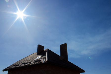 sun over the houseの写真素材