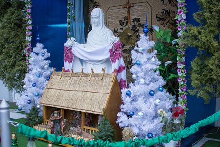beautiful photo Christmas card with Marit statue of God at Christmas with the birth of Jesus hutsの写真素材