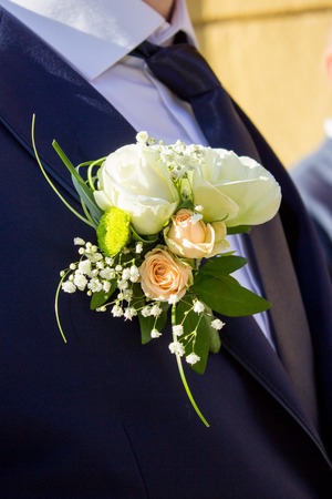 groom boutonniere on a costume of a profileの写真素材