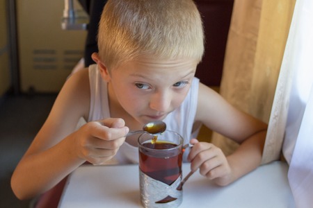 drink tea on the trainの写真素材