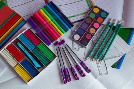 school supplies on a notebook