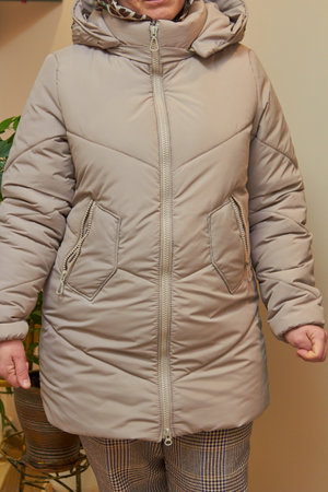woman in a winter modern jacket, fashionable winter seasonの写真素材