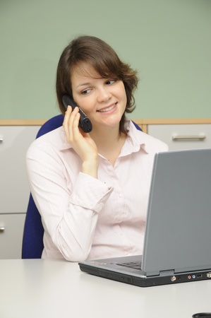 young woman in the officeの写真素材