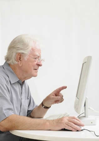age with one computerの写真素材
