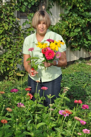 Woman in a Gardenの写真素材