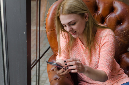 Young girl is using her cell phone