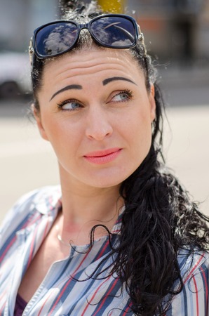 young girl walking on the cityの写真素材