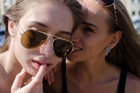 Two girlfriends enjoing time together during the summer