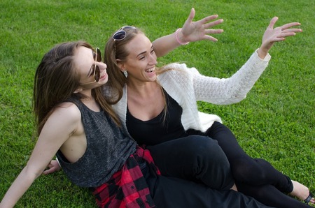 Two girlfriends enjoying time during the summerの写真素材