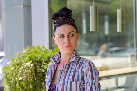 young girl walking on the cityの写真素材