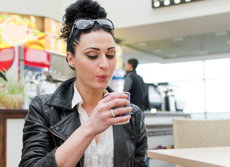 Young woman with a cup of coffee