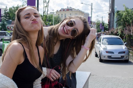 Two girlfriends enjoing time together during the summer
