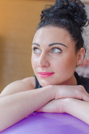 Young woman is making titness exercisesの写真素材