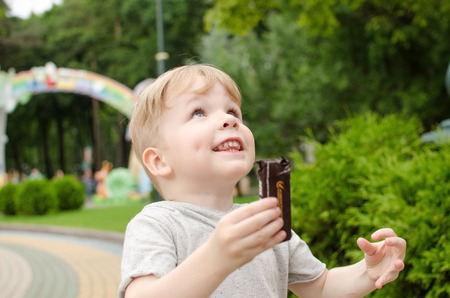 Small baby child having fun in the parkの写真素材