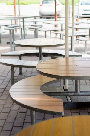 empty seats and tables in cafe