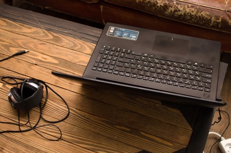 Close up of lap top on the wooden tableの写真素材