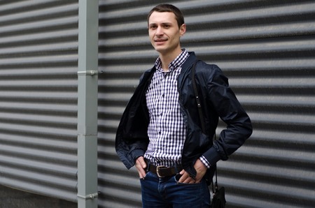 Young man resting and walking in the sityの写真素材