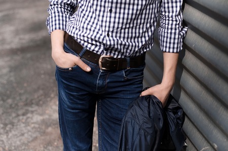 Young man resting and walking in the sity