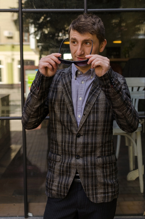 Man is going to put on the sunglassesの写真素材