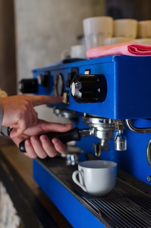 Close-up photo of new blue coffee machineの写真素材