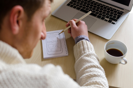 Man thinking about what he paintedの写真素材