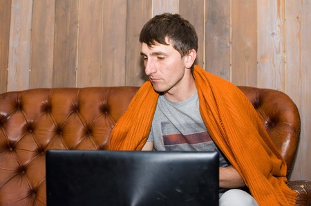 Young man is resting in the cafe