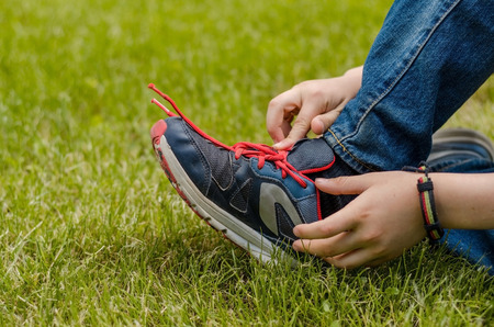Young man enjoying time with teenager in the park