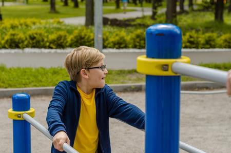 Teenager on the breams in the parkの写真素材