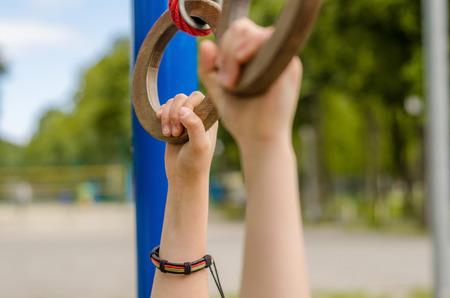 Teenager on the brams in the parkの写真素材