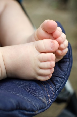 Close up of two small child's legs