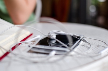 Telephone with the headphones on the table