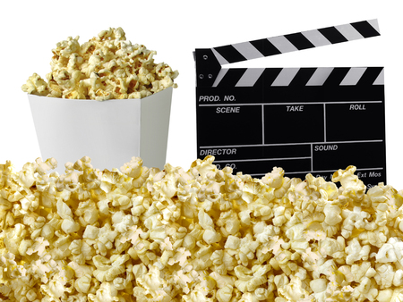 Movie clapperboard and popcorn isolated on whiteの写真素材