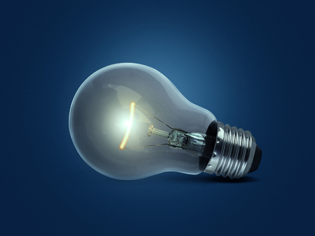 light bulb, on blue backgroundの写真素材