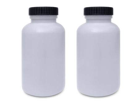 plastic bottle with black lid, on white backgroundの写真素材