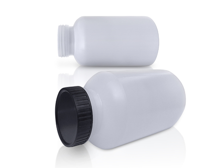 plastic bottle with black lid, on white backgroundの写真素材