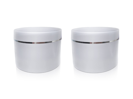 white jar of hand cream or gel with a silver stripe for your designの写真素材