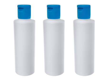 White plastic bottle Blue cap. isolated on white backgroundの写真素材