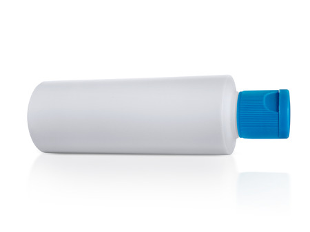 White plastic bottle Blue cap. isolated on white backgroundの写真素材