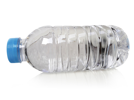 Small plastic water bottle with water drops. isolated on a white backgroundの写真素材