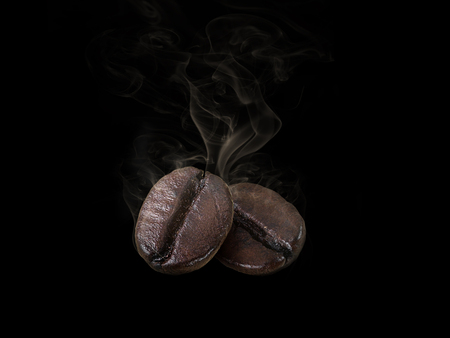 Coffee bean. with smoke on black backgroundの写真素材