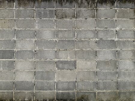 Scratches and black dirt on the rough gray surface of the concrete wall,Background and Texture for add text or graphic designの写真素材